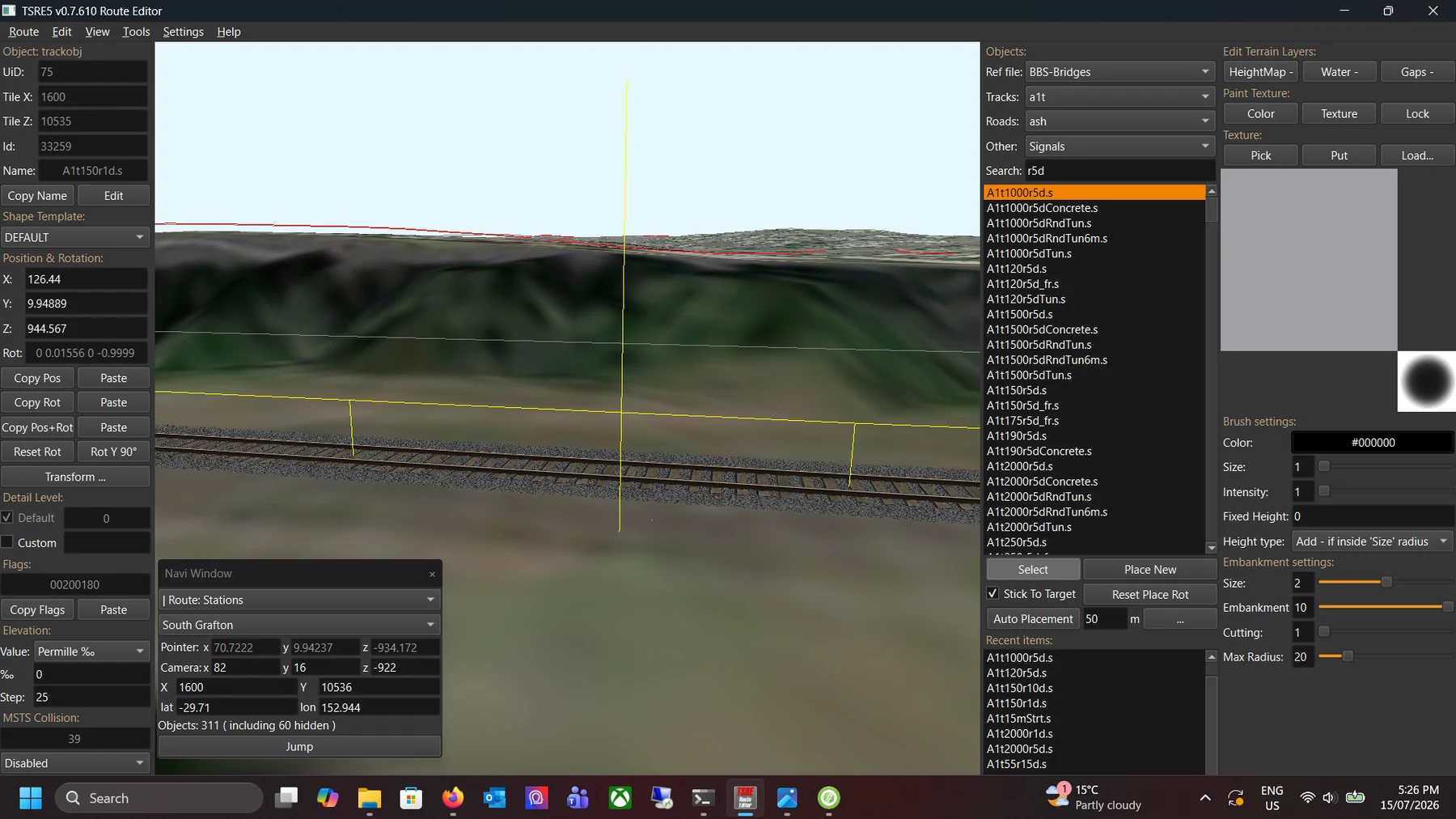 TSRE5 view of railway track sitting on shaped terrain and an embankment.